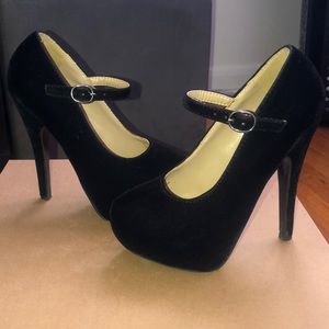Black suede platform heels